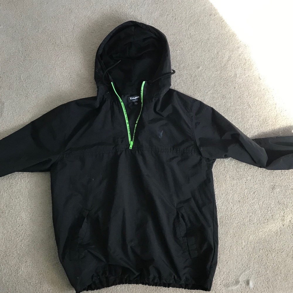 Large playboy windbreaker.
